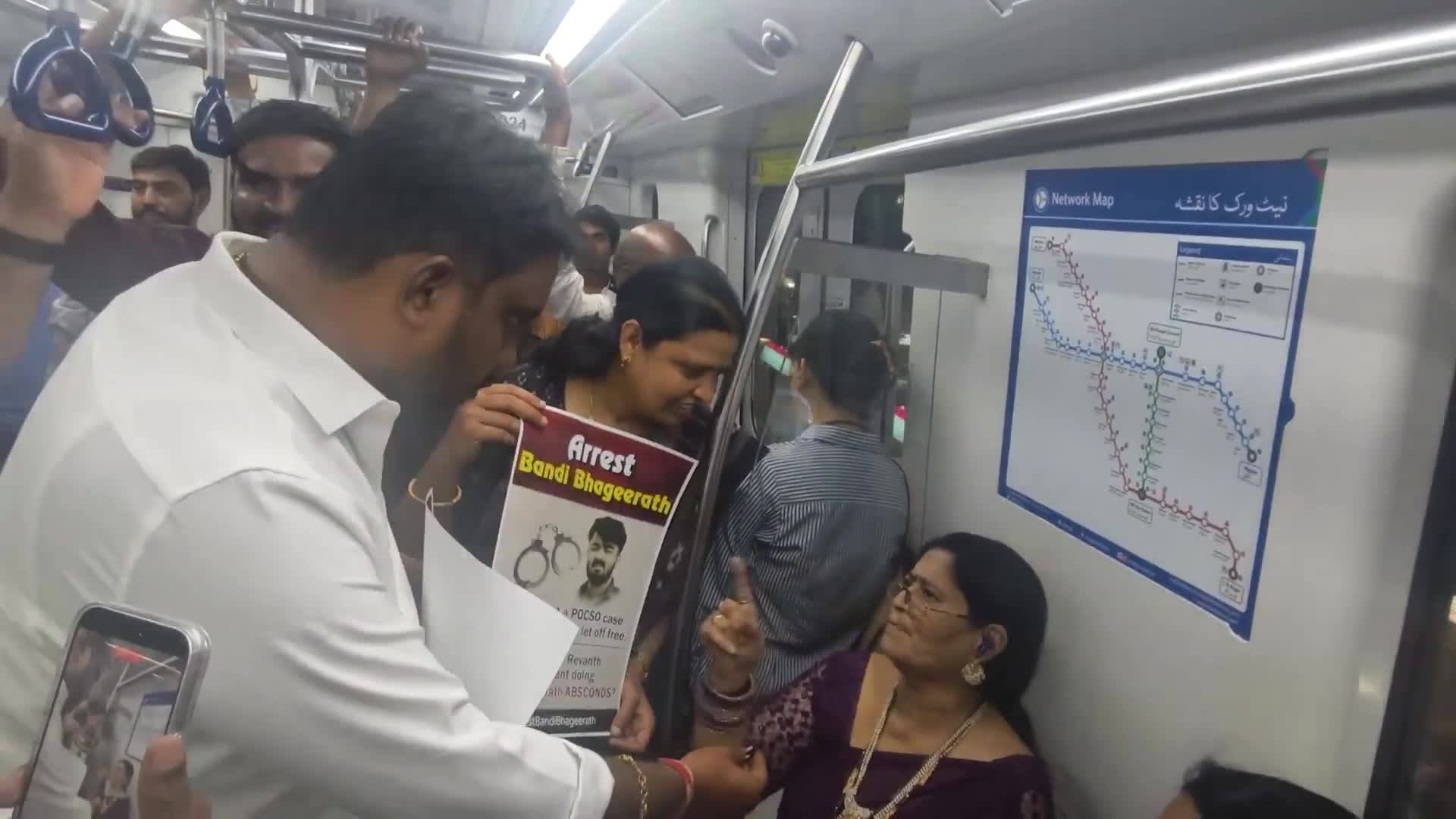 బండి సంజయ్ కొడుకు పోస్టర్లతో మెట్రోలో ప్రచారం..